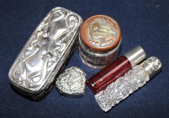 Collection of silver mounted scent bottles & pill boxes